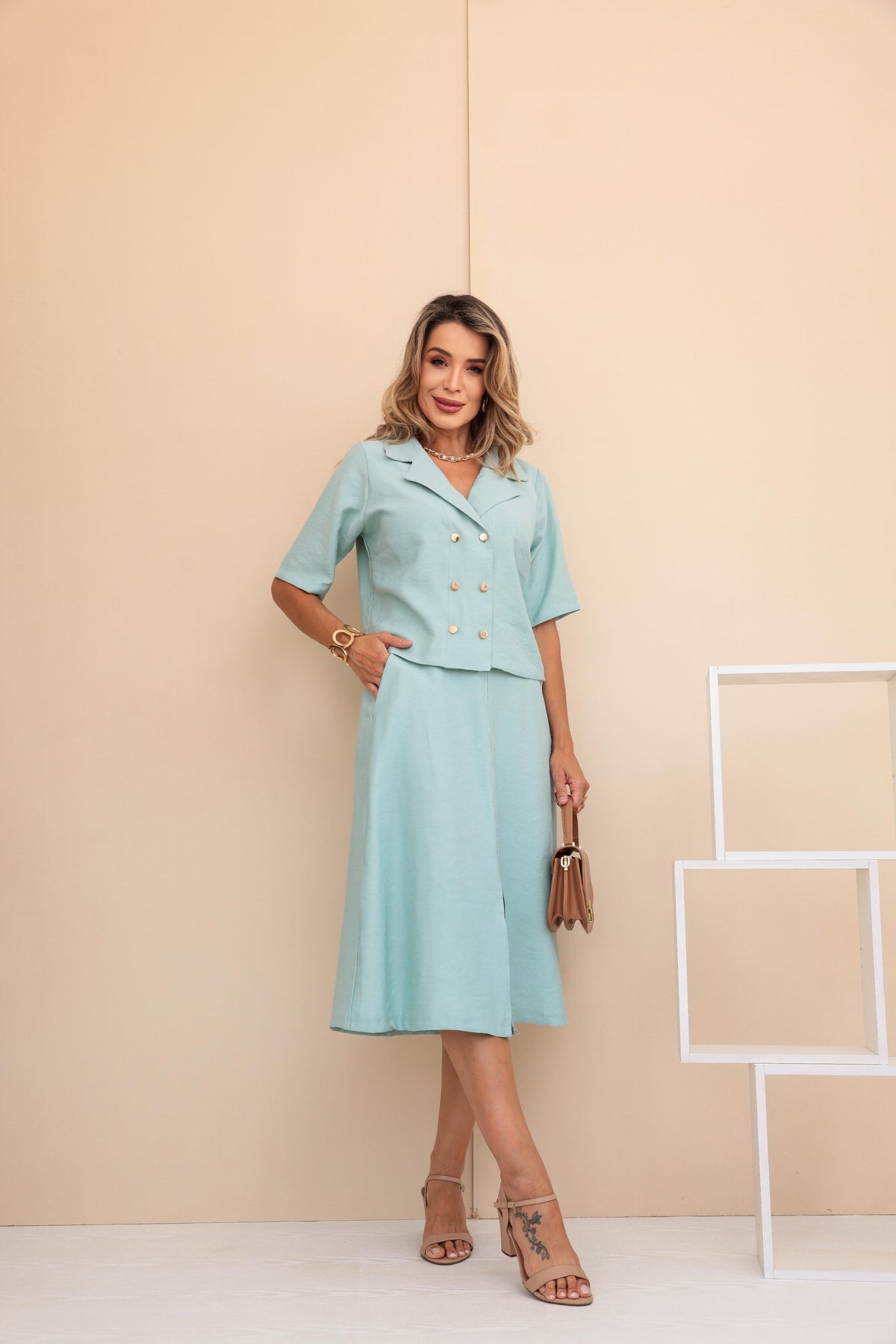 Conjunto de saia e blusa com botões Isabela