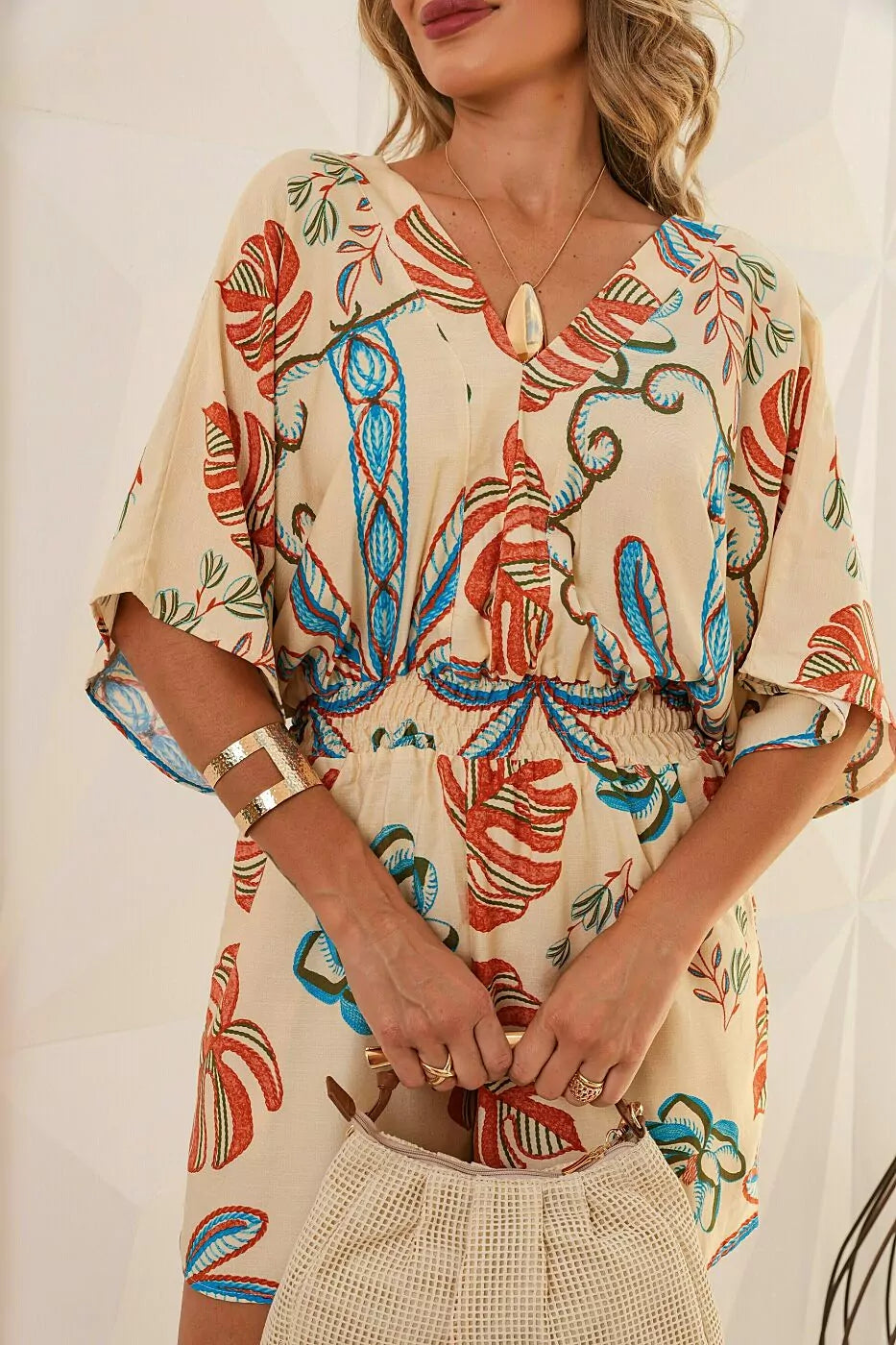 Macaquinho de shorts com blusa manga curta e decote V Tulum